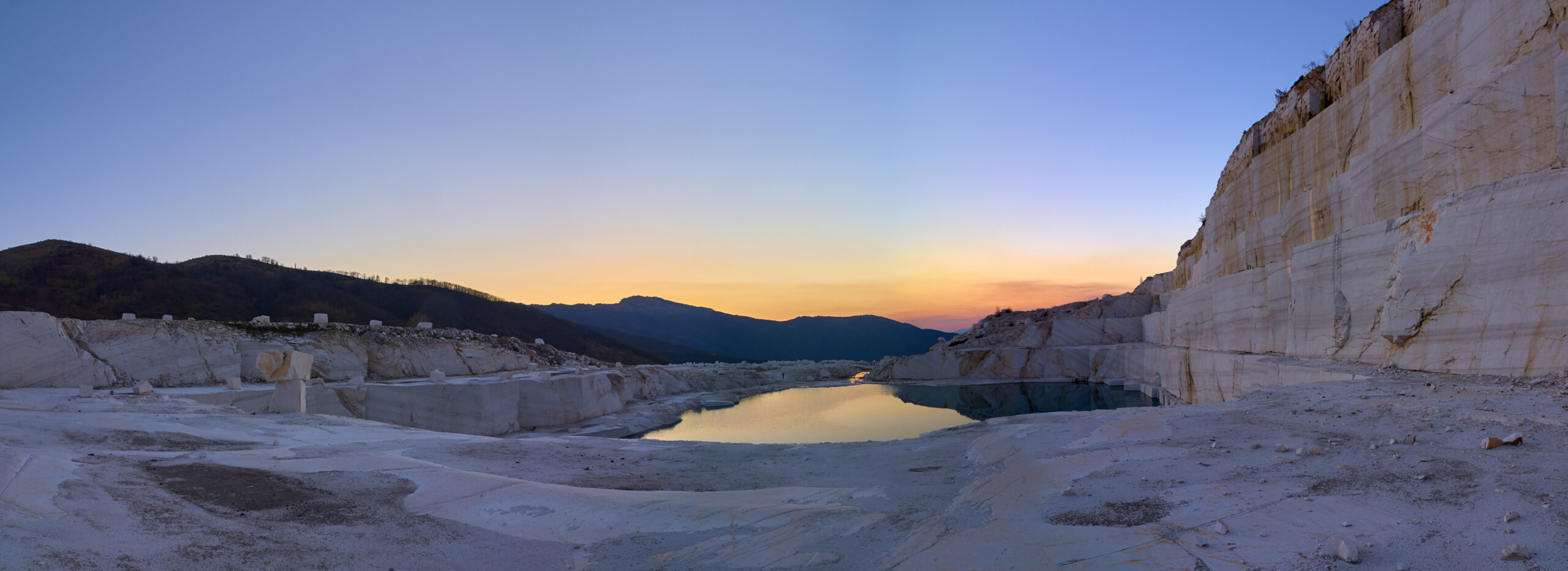 Sunset,Over,The,Marble,Lake,In,Middle,Of,Abandoned,Marble